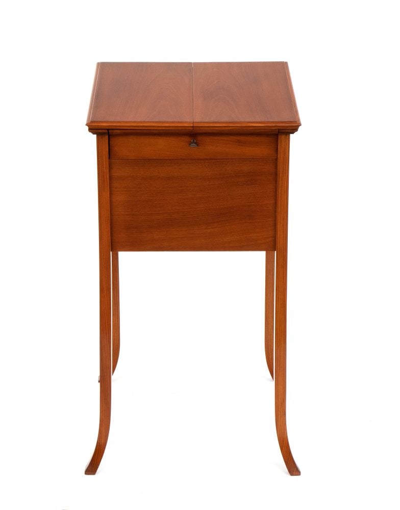 FERNAND BLONDEAU () French smoking table - Paris, 20th century: FERNAND BLONDEAU() French smoking table - Paris, 20th centuryHeight x width x depth: 78 x 42 x 45 cm.mahogany wood, with central drawer concealing compartment underneath, booklet top opening with ciga