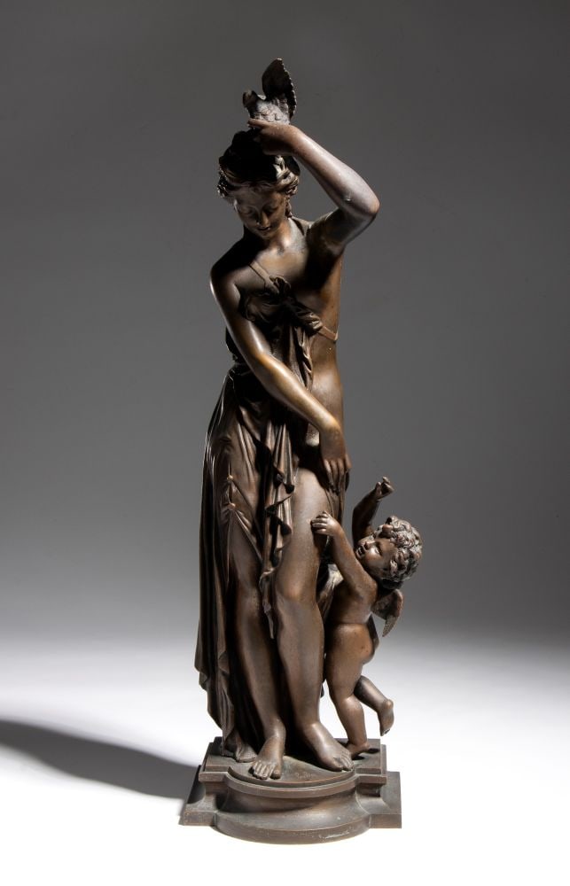 JEAN BULIO (1827 - 1911) Bronze Sculpture Venus and Cupid (Innocence and Love): JEAN BULIO(1827 - 1911) Bronze Sculpture Venus and Cupid (Innocence and Love)Height x width x depth: 47 x 16 x 18 cmFrance, 19th centuryThe sculpture, with its brown patina, rests on an integrated,