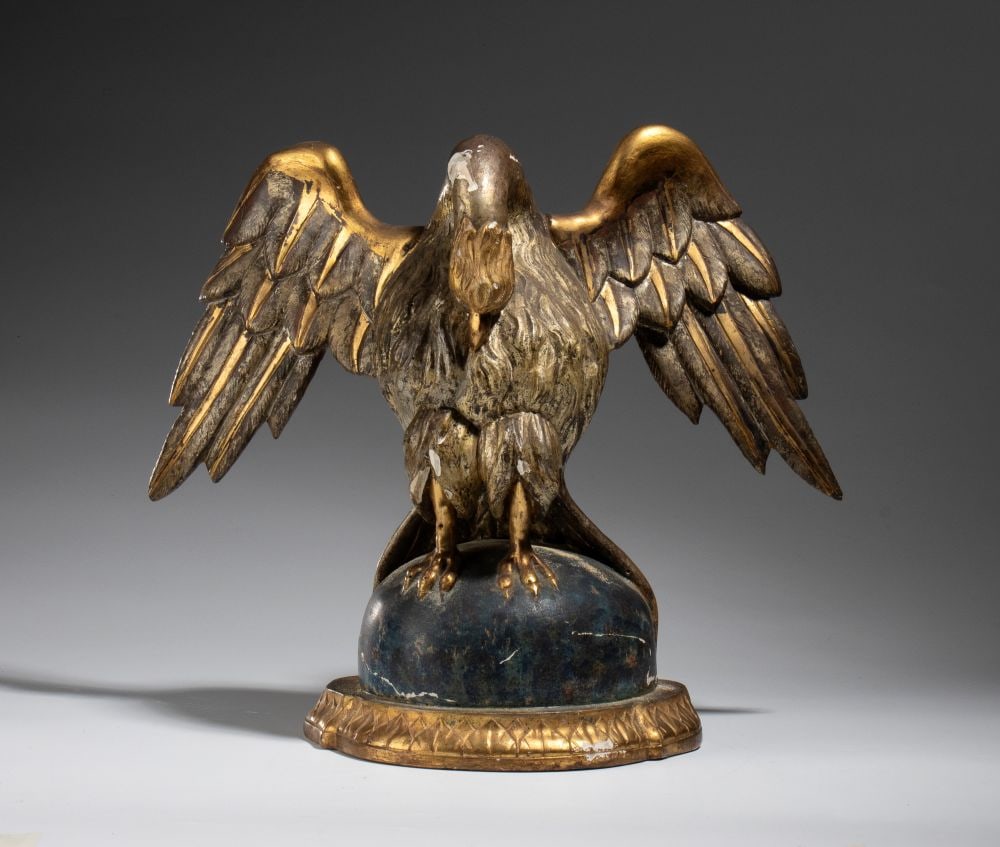Carved and gilded wooden sculpture: Carved and gilded wooden sculpture Height x width x depth: 32 x 37 x 16 cmFrance, late 18th–early 19th centurydepicting a pelican/swan piercing its own chest, resting on a spherical base