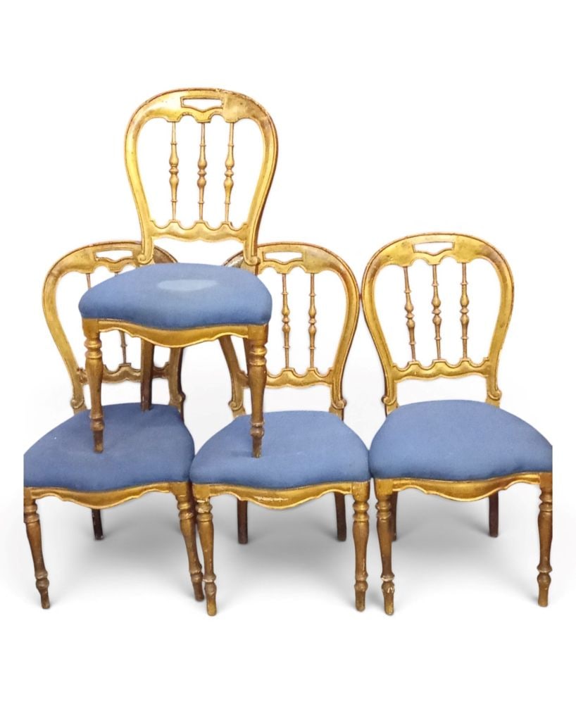 Set of four gilded chairs: Set of four gilded chairsFrance, 19th centurya carved wooden living room chair. The backrest is shaped like a “hot-air balloon” with a handhold integrated into the upper panel. The front