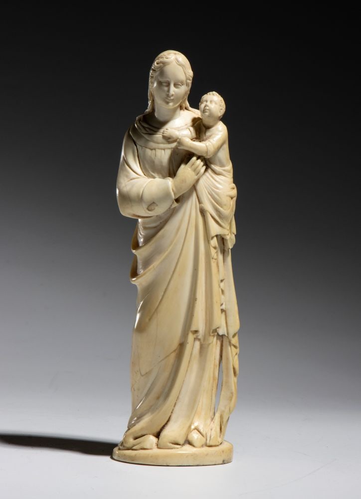 Madonna and Child in Ivory: Madonna and Child in IvoryHeight x width x depth: 20 x 5 x 6 cmItaly or France, 17th centuryDepicted according to the iconographic style derived from French models, the Madonna stands in a slight