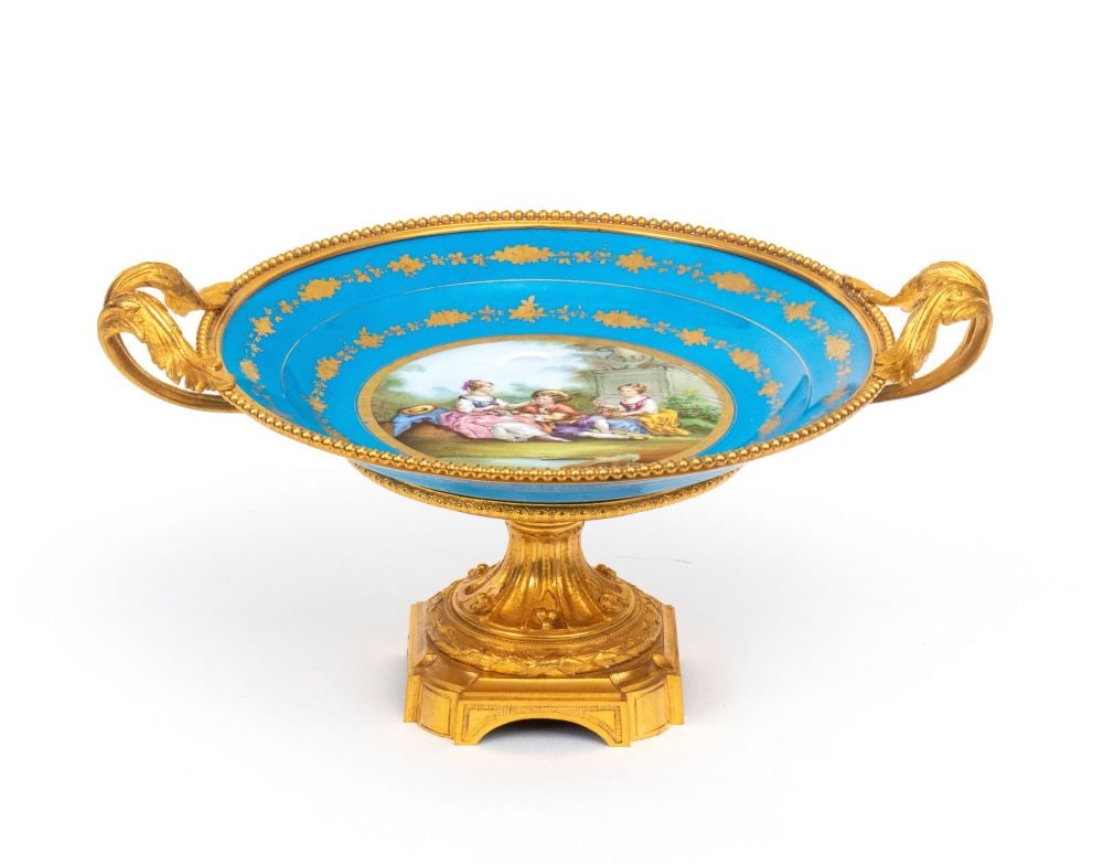 Sèvres porcelain stand with gilt bronze mount: Sèvres porcelain stand with gilt bronze mountHeight x diameter: 22 x 32 cm19th centurydated 1867, blue “bleu cèleste” enamel, finely decorated with gold reserves and a