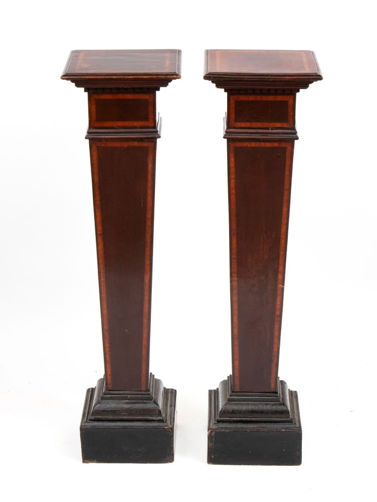 Pair of pedestals: Pair of pedestals Height x width x depth: 112 x 31 x 31 cm England, 20th centuryMade of mahogany and inlaid with fruitwood; the bases feature molded plinths finished in ebony.Item condition grading: *