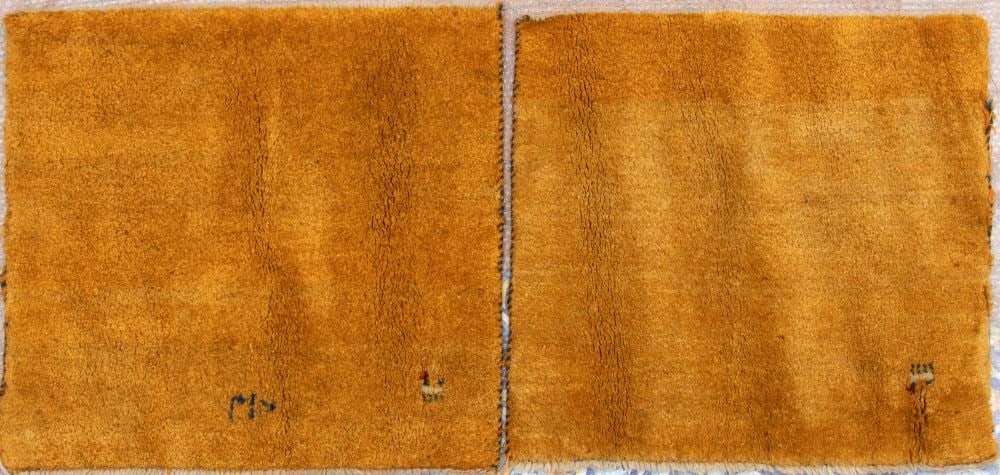 Pair of carpets - China, 20th century: Height x width: 73,5 x 70 cm. eachItem condition grading: **** good.The lot is in a good state of preservation with the normal wear and defects commensurate with its age and use over time.