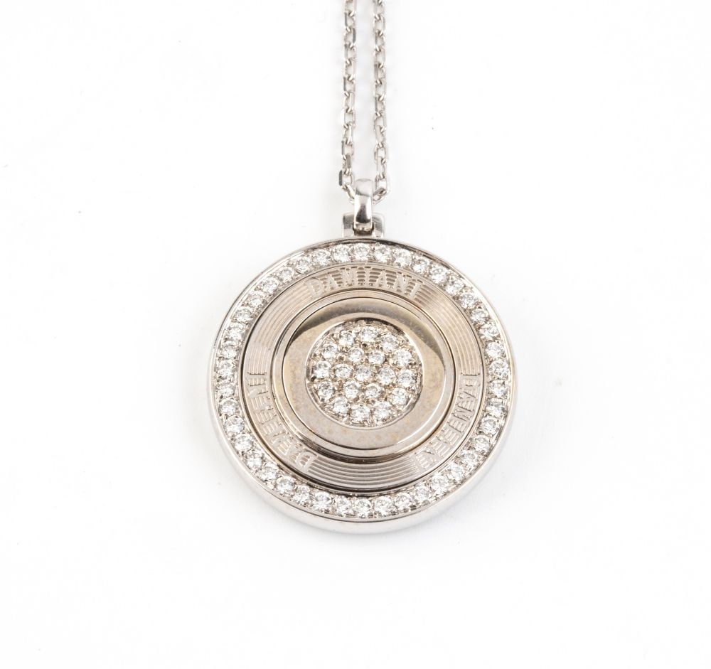 DAMIANI "ORBITAL" Collection: gold necklace with diamonds: With thin 18k white gold forged link chain interrupted by diamond ring motifs; circular geometric patterns fringe to depict a spatial orbitals, whose sun and planets stars are represented by pave set 