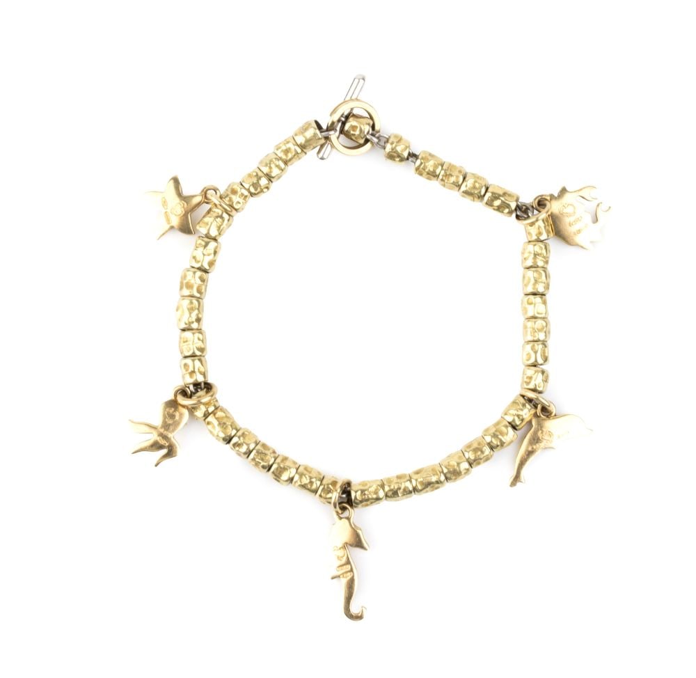 DODO Gold and silver bracelet with pendants: 18k yellow gold and silver, featuring a row of nugget-shaped elements from which five pendants depicting marine animals are suspended.Hallmarked "750 – 925 - 351 MI – Dodo symbol".Length: 