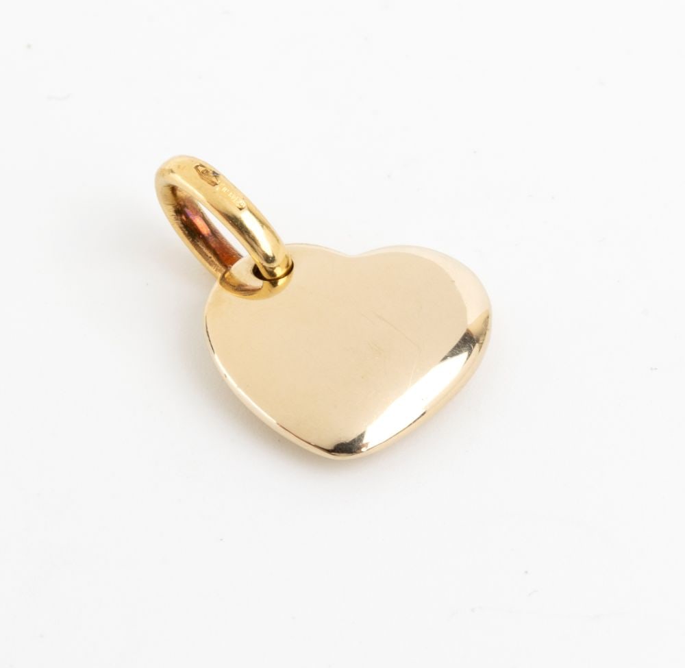 POMELLATO Heart gold pendant: 18k yellow gold.Hallmarked "750 - 469 MI". Signed "POMELLATO". Weight: 7.8 g.