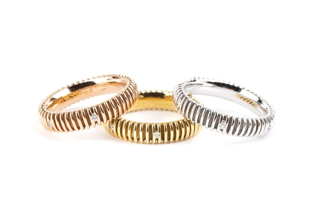 SALVINI Three gold rings set with diamonds: 18k white, yellow and rose gold, set with brilliant-cut diamonds with an estimated total weight of approx. 0.08 ct.Hallmarked “750 – 3181 AL - MADE IN ITALY”. Signed "SALVINI".IT siz