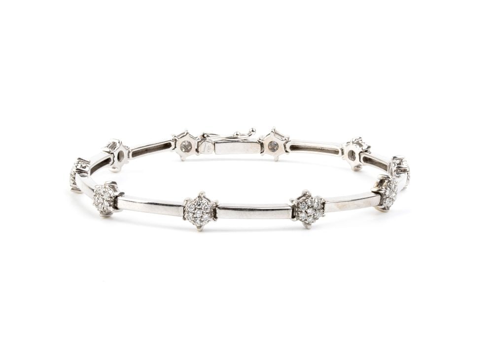 SALVINI "Stars" diamond gold bracelet: 18k white gold, set with 70 brilliant-cut diamonds with estimated total weight of approx. 0.80 ct, colour F-G, clarity VS.Hallmarked “750”. Signed: "SALVINI”.Length: 17.5 cm. Weight: