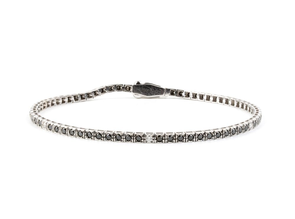 RECARLO Diamond gold tennis bracelet: 18k white gold, set with a row of black diamonds with an estimated total weight of approx. 1.00 ct and colourless brilliant-cut diamonds with an estimated total weight of approx. 0.15 ct.Hallmarked