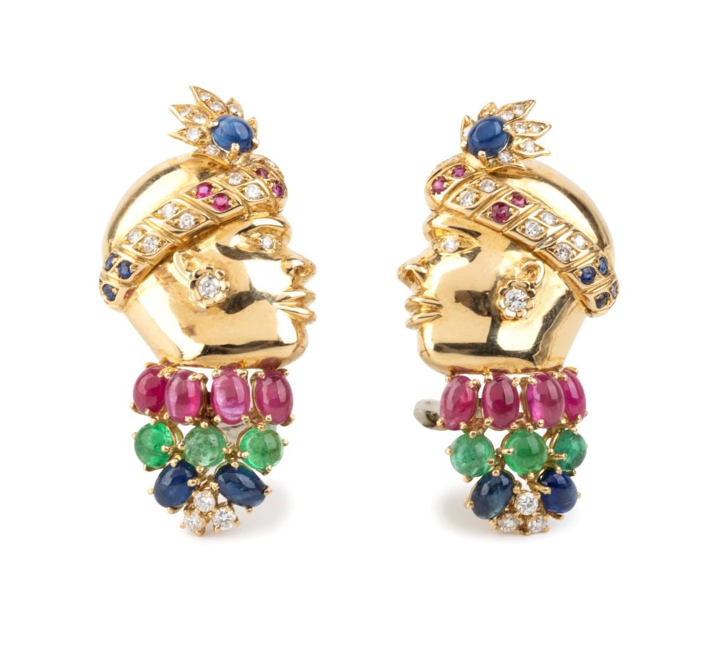 FILIPPO MORONI Ruby sapphire emerald diamond gold pair of errings: 18k yellow gold, depicting the mirror-image profiles of two "moretti"; each figure wears a lavish turban adorned with diamonds, rubies and sapphires, small diamond earring, the lower section features