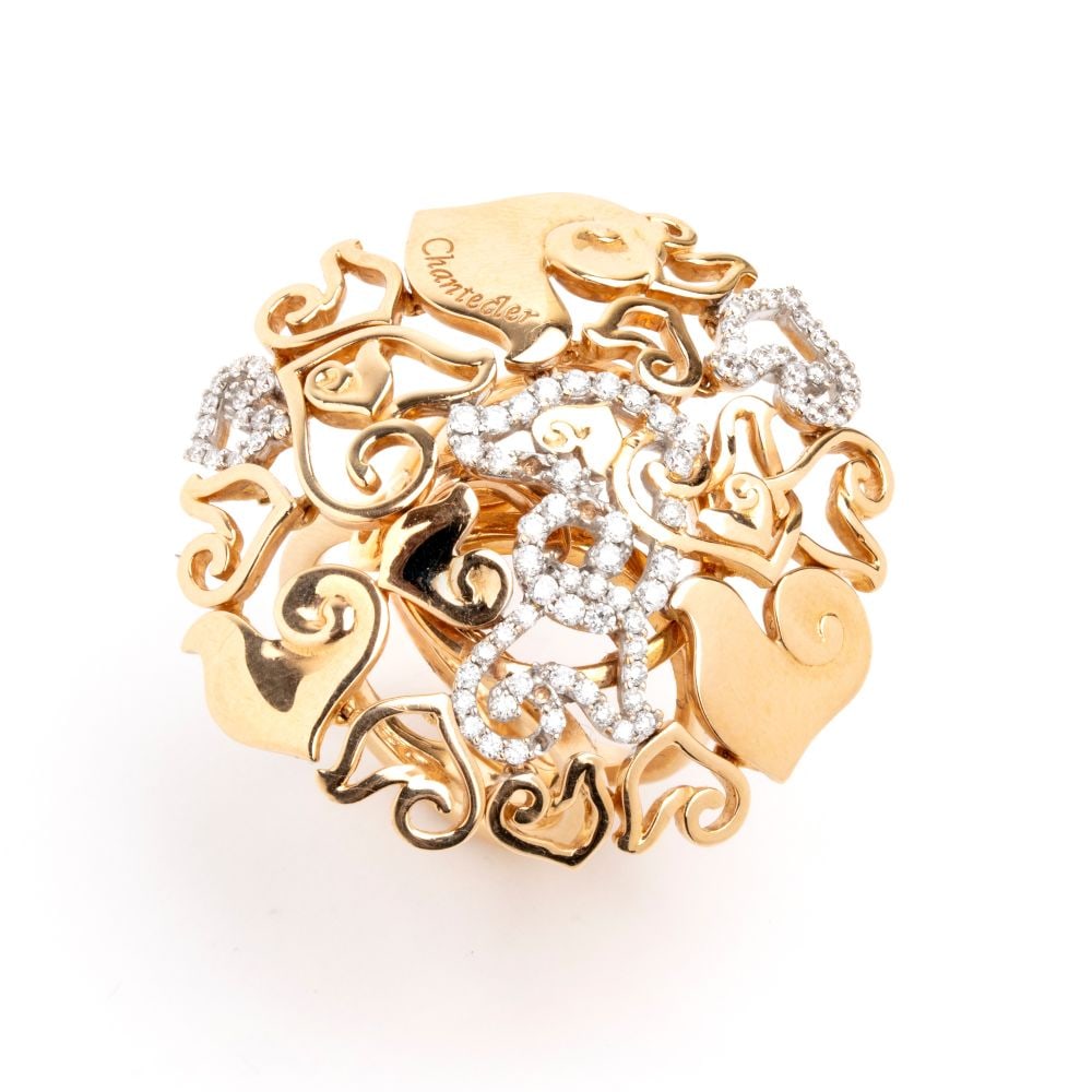 CHANTECLER Diamond gold ring: A wide, openwork 18k pink and white gold band ring, featuring an intricate and sinuous pattern of hearts and arabesques, set with brilliant-cut diamonds estimated total weight of approx. 0.70 ct,