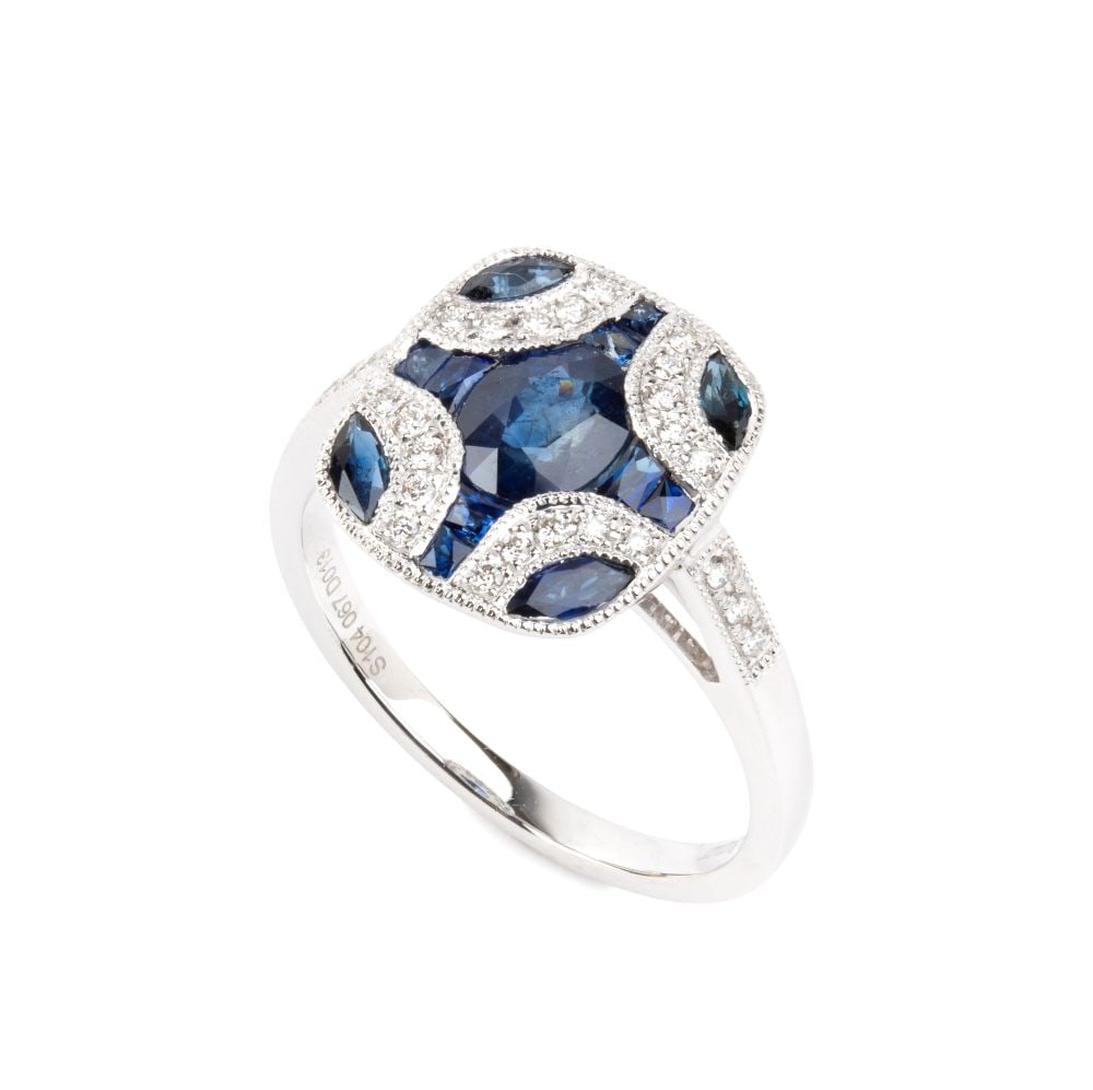 BRANAR PARIS Art Deco-style platinum ring with sapphires and diamonds: A geometric design set with sapphires and diamonds. No. 01 oval-shaped sapphire, composite cut, estimated to weigh approx. 1.04 ct; other round sapphires estimated to weigh a total of 0.67 ct and