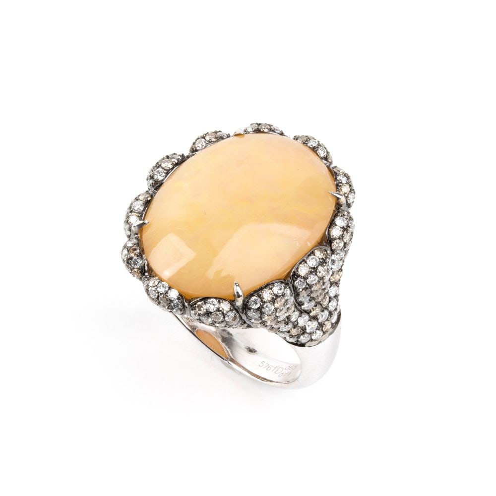 BRANAR PARIS White opal diamond gold ring: 18k white gold, set with a central white opal, shank and basket set with round brilliant cut incolor diamonds, estimated to have a total weight of approximately 0.71 ct, colour G-H, clarity VS, and