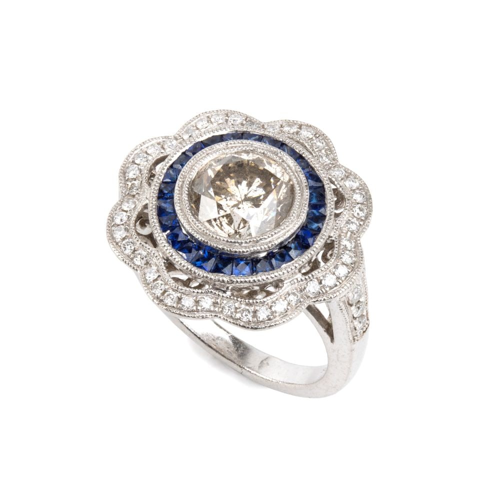 BRANAR PARIS Platinum diamond sapphire gold ring: Platinum floral motif, set with a central fancy-color brown brilliant-cut diamond, estimated to weigh approx. 2.23 ct, framed by other small brilliant-cut diamonds estimated to weigh a total of
