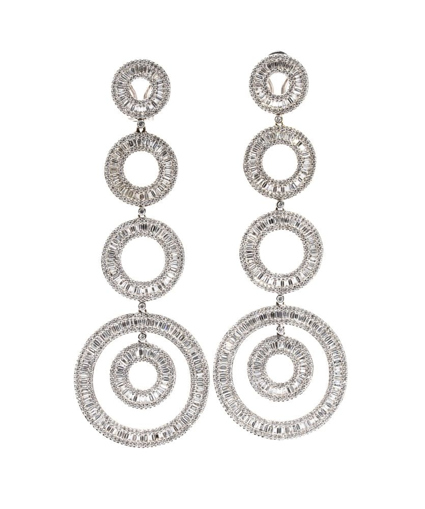 A pair of gold and diamond drop earrings: 18k white gold, featuring dangling hoops with set brilliant cut and baguette cut diamonds estimated to weight a total of approx. 8.30 ct, F-G colour, VVS-VS clarity, as gauged and graded in the mount.