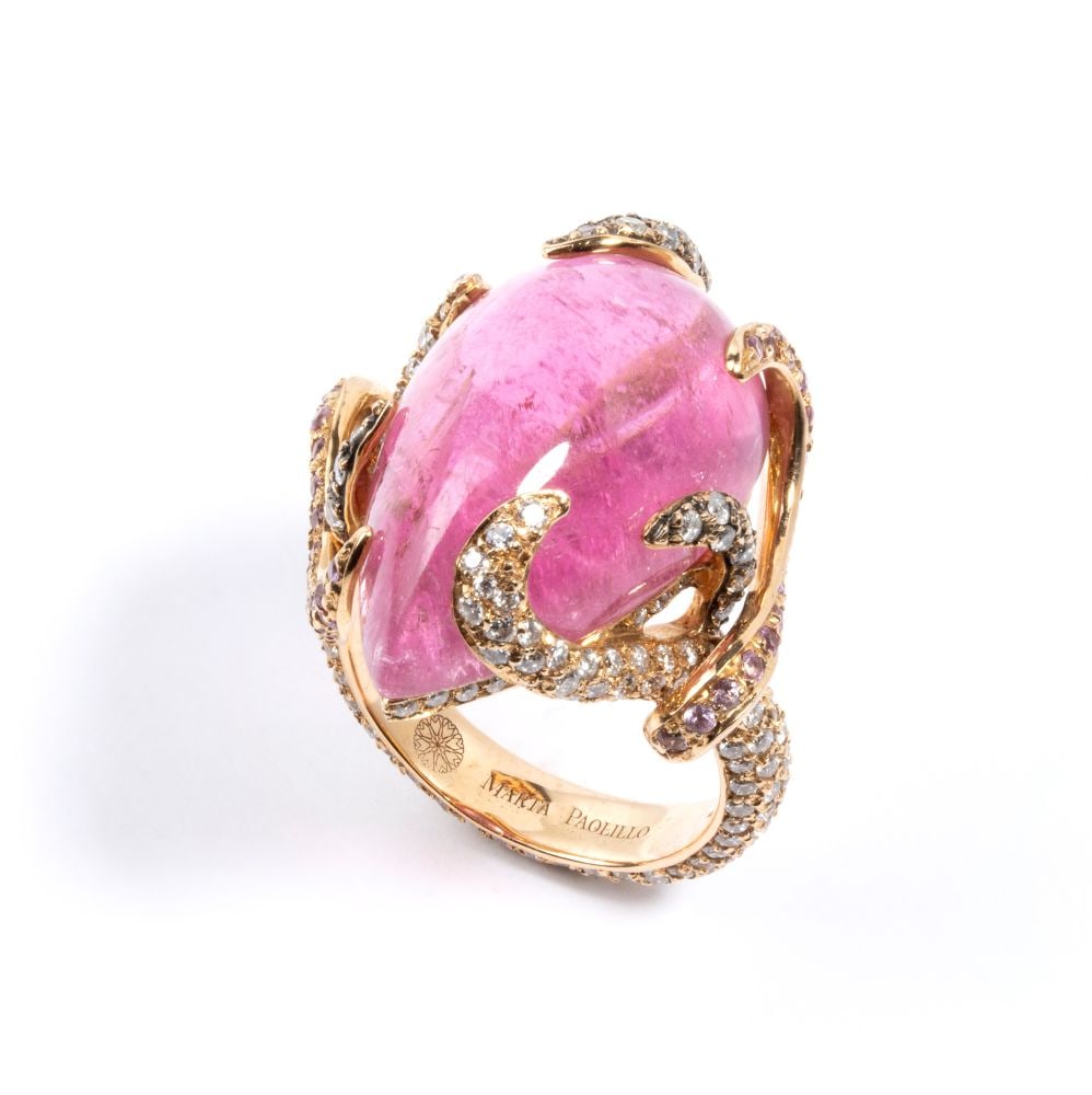 Ring with tourmaline, pink corundums and diamonds: 18k pink gold, set with pear shaped pink tourmaline, estimated approx. 19.91 ct, surrounded by pink sapphire pave set estimated total weight approx. 0.80 ct and round brilliant cut diamonds,