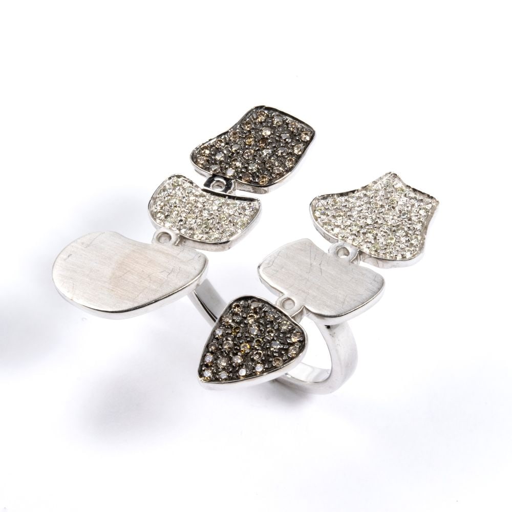 PYTON gold diamond ring: white and yellow gold fancy design, with pavé-set colourless diamonds estimated total weight of approx. 0.80 ct and fancy color brown diamonds, estimated total weight of approx. 0.80 ct. Signed