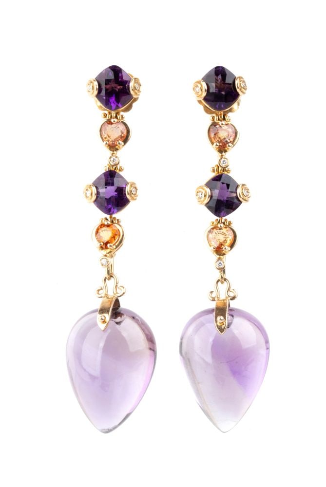 Amethyst fancy sapphire gold drop pair of earrings: 18k yellow gold, featuring a line of amethysts separated by orange sapphires, a large amethyst teardrop at the end and diamond detailing.Hallmarked "750". Length: 7.5 cm. Weight: 28.2 g