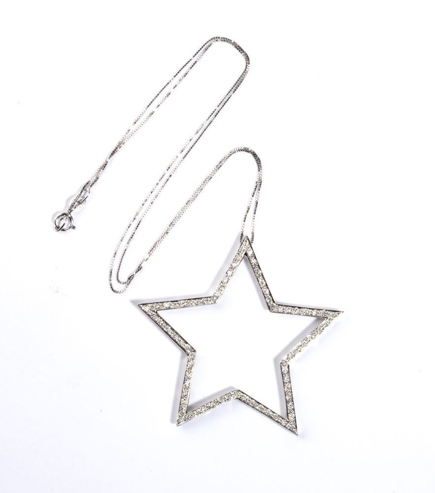 Diamond gold pendant: 18k white gold, with thin chain from which hangs pendant set with round brilliant-cut diamonds, estimated to weigh a total of approx. 0.70 ct, G colour, VS clarity, as gauged and graded in the