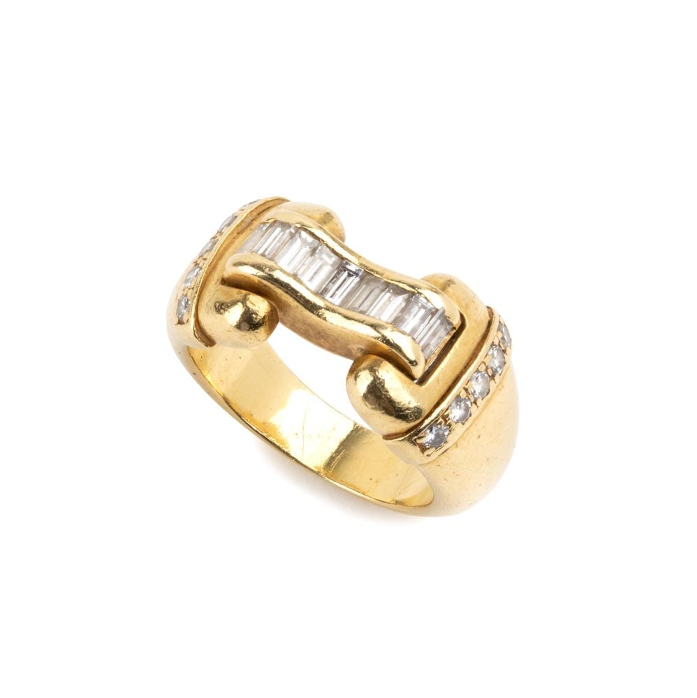 Diamond-set buckle design gold ring: 18k white gold, set with brilliant-cut and baguette-cut diamonds, estimated total weight of approx. 0.50 ct, colour G-H, clarity VS-SI, as gauged and graded in the mount.IT size 11 – US size 6.