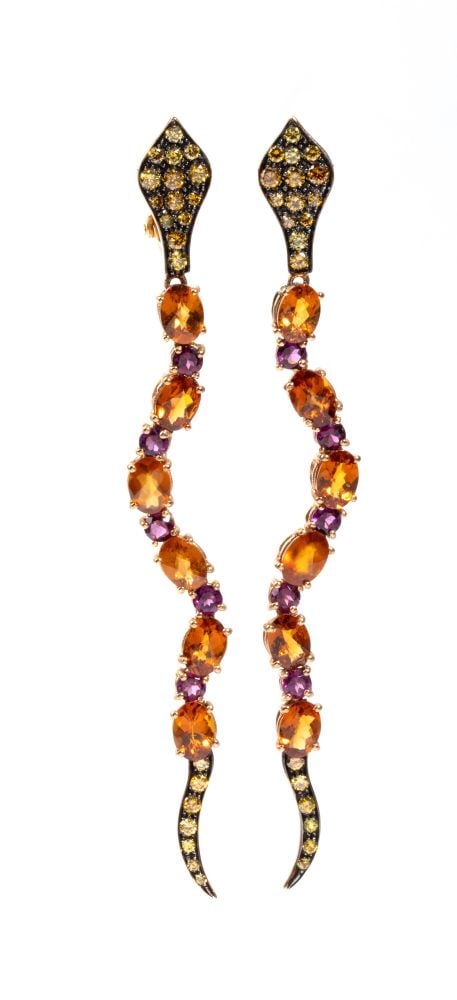 Diamond tourmaline and citrine quartz gold earrings: 9k pink gold, featuring a sinuous pattern that mimics the snake moviment, the body set with line of citrine quartz and tourmaline, with pave set round brilliant cut yellow color diamonds estimated tot