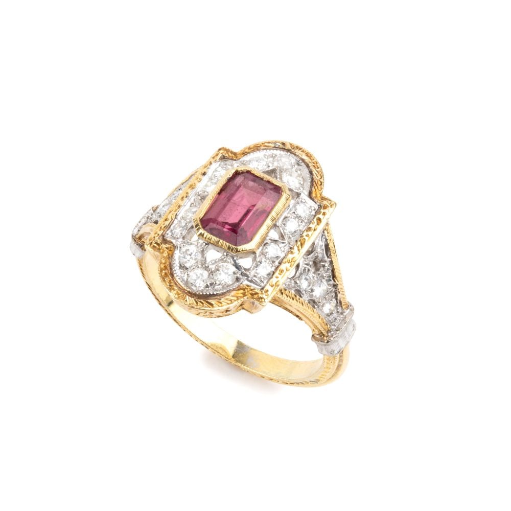 Tourmaline diamond gold ring: 18k yellow and white gold, set with a pink tourmaline surrounded by brilliant-cut diamonds with an estimated total weight of approx. 0.50 ct, colour G-H, clarity VS, as gauged and graded in the