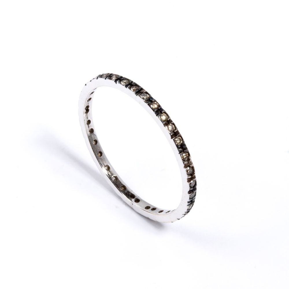 Fancy color brown diamond gold ring: 10k white gold, set with brown color, round brilliant-cut diamonds, estimated total weight approx. 0.65 ct, as measured and graded in the mount.IT size 14 – US size 7 ½. Weight: 0.8 g.