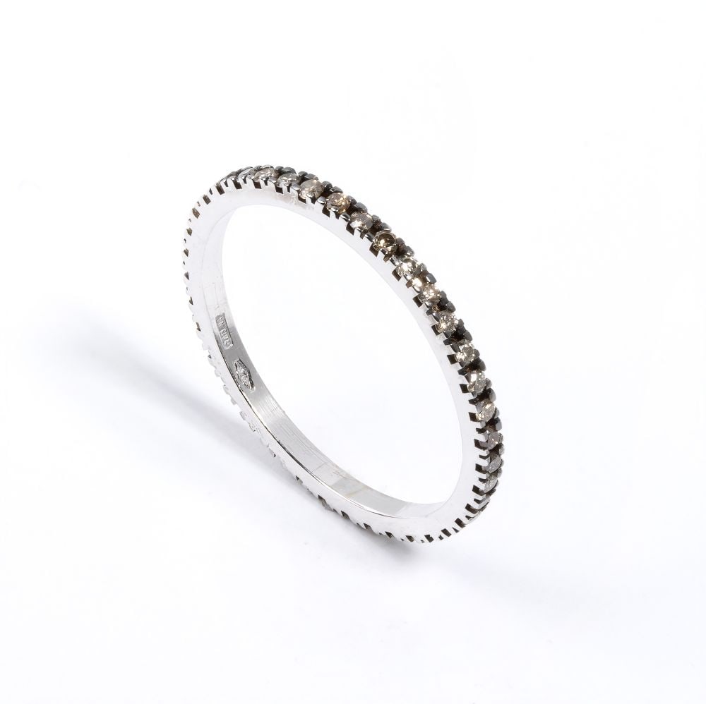 Fancy color brown diamond gold ring: 18k white gold, set with fancy color brown diamonds, estimated total weight approx. 0.26 ct, as measured and graded in the setting.Hallmarked “750 – 613 NA”. IT size 13½ –