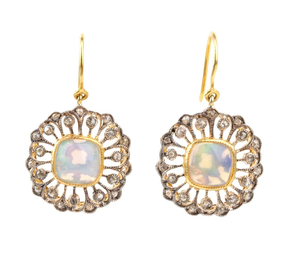 Opal diamond gilded silver: Gilded sterling silver, each set with white opal at the centre of a radiating openwork pattern of rose-cut diamonds. Hallmarked "925". Dimensions: 3 x 2 cm. Weight: 4.3 g.