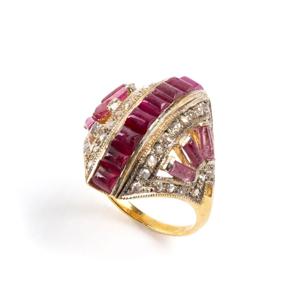 Diamond ruby silver ring: geometrically shaped, set with round-cut and rose-cut diamonds, and rectangular-shaped rubies in a composite cut.Hallmarked "925". IT size 9 - US size 5. Weight: 4.9 g