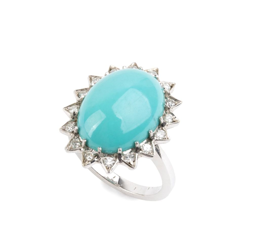 Turquoise diamond gold ring: 18k white gold, set with a cabochon cut turquoise framed by huit-huit-cut diamonds estimated total weight of approx. 0.50 ct, colour G-H, clarity VS.IT size 9 – US size 5. Weight: 5.7 g.