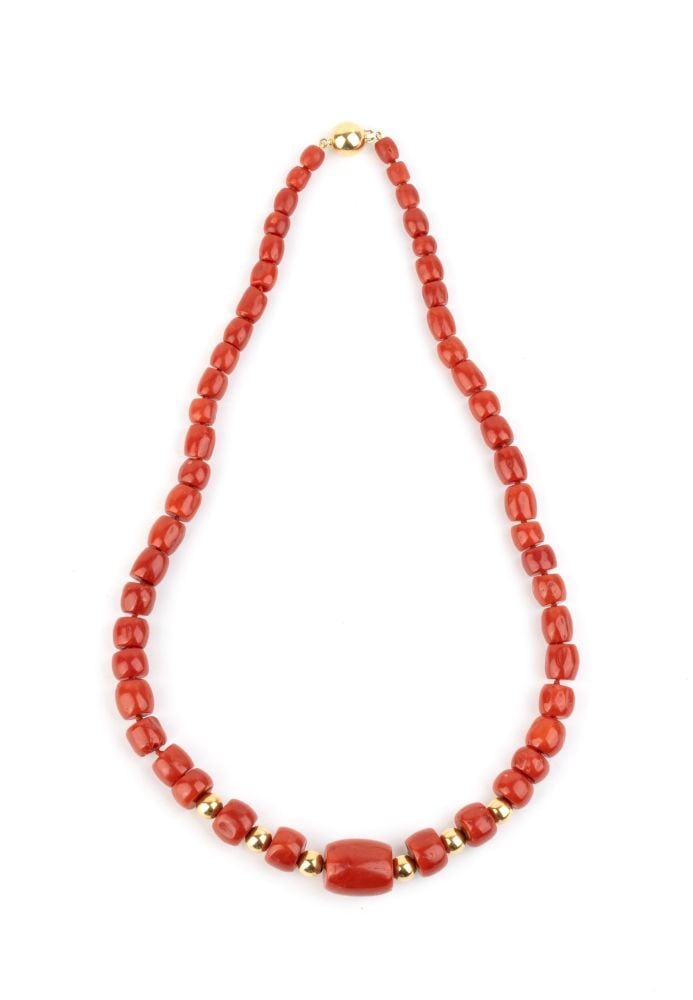 Mediterranean coral necklace with yellow gold clasp: One strand of graduated Mediterranean coral beads (Corallium rubrum), with 18k yellow gold clasp and spacers.Hallmarked "750".Coral diameter: 15 to 6.5 mm. Length: 50 cm. Weight: 64.7 g.