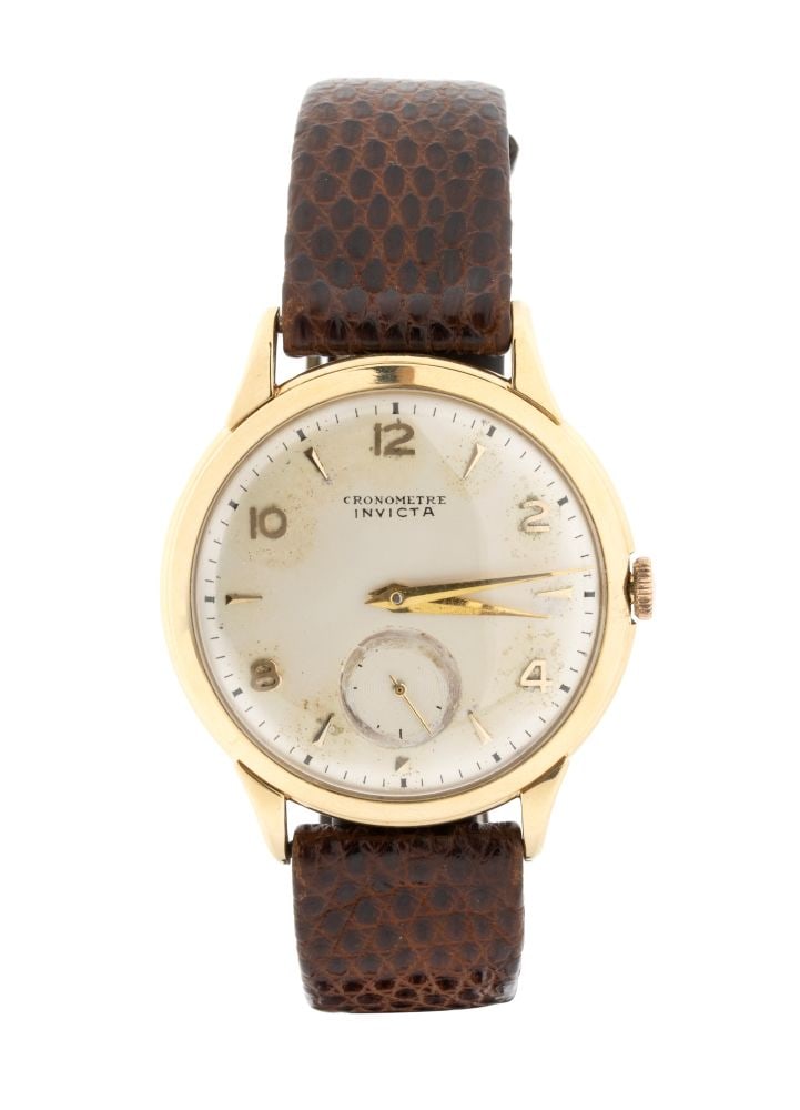 INVICTA Wristwatch: con cassa in oro e cinturino in pelle. Movimento meccanico a carica manuale.Lunghezza: 22 cm. Diametro della cassa: 38 mm. Peso lordo: 35.6 gr. Peso dell'oro: 11.5 gr.