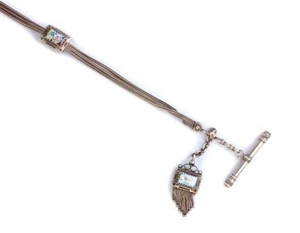 French silver and enamel pocket watch chain: with polychrome enamels and floral decorations.Length: 32 cm. Weight: 42 g.