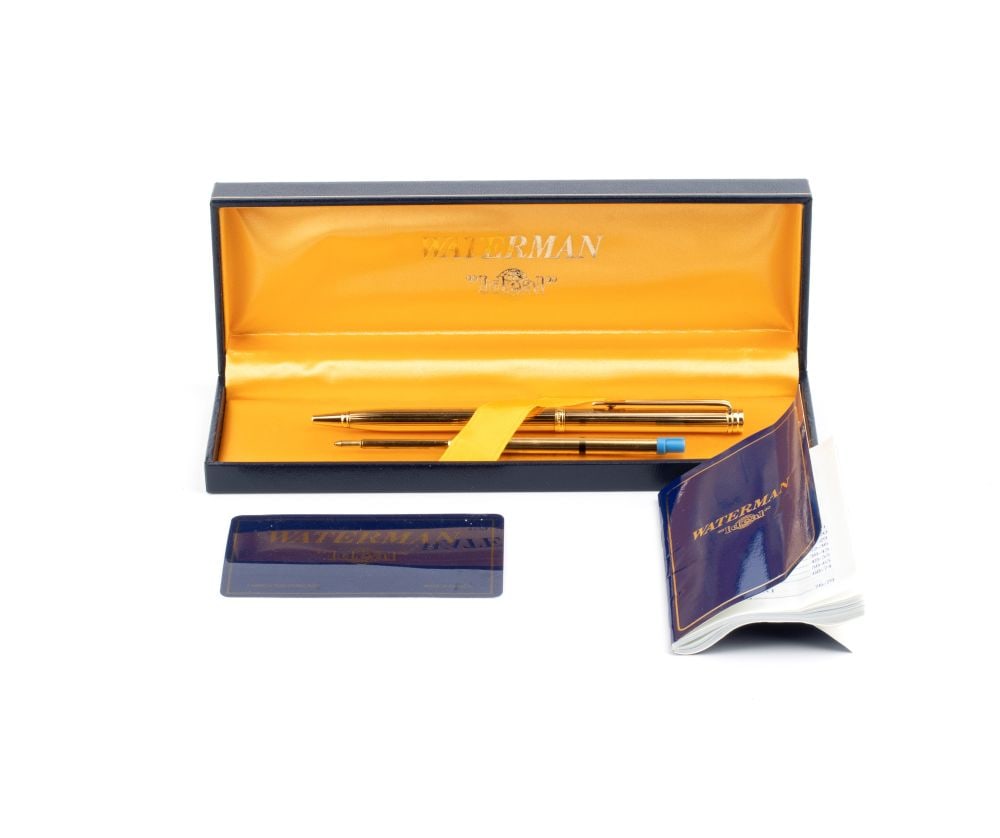 WATERMAN 502 Ballpoint pen: consisting of a refill and a gold-plated pen, with a tapered barrel and cap, and bearing the WATERMAN logo.It comes with the original box and guarantee.