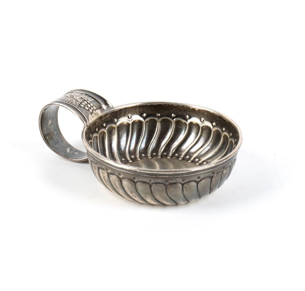 MARIO BUCCELLATI Sterling silver tastevin: Height x width x depth: 3.5 x 8 x 11 cm. Weight: 102 gin the classical French and European tradition. The bowl features a shoulder decorated with a dense pattern of diagonal raised ridges,