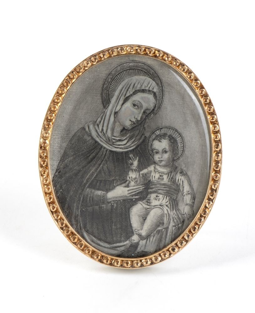 GIANMARIA BUCCELLATI Silver and gold pendant featuring a miniature of the Madonna and Child: set at the centre is an exquisitely fine miniature on a plaque depicting the Madonna and Child, rendered in grisaille. The oval outer frame features an inner border in yellow gold, finely chiselled wi
