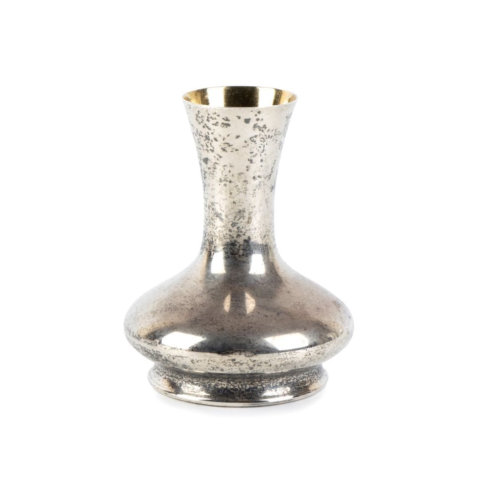 BULGARI Sterling silver Solifiore vase: with a moulded circular base that gives way to a flattened spherical body, before tapering upwards into a flared cylindrical neck that ends in a goblet-shaped rim. The inside of the rim is finished in