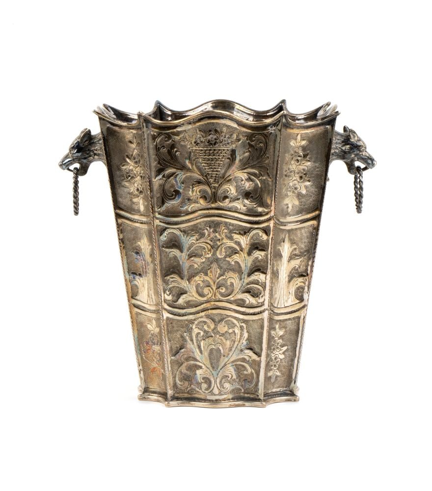 Italian solid silver champagne bucket: made with cast, with floral and plant motifs in moulded geometric sections and handles shaped like a cat’s head.800/1000 silver, hallmarked "800".