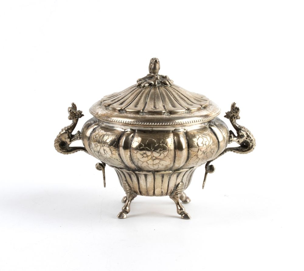 italian solid silver sugar bowl: globular in shape, with vertical ribbing alternating with floral motifs, resting on four horse-hoof-shaped feet. Dragon-shaped handles on the sides.800/1000 silver, hallmarked “800”.