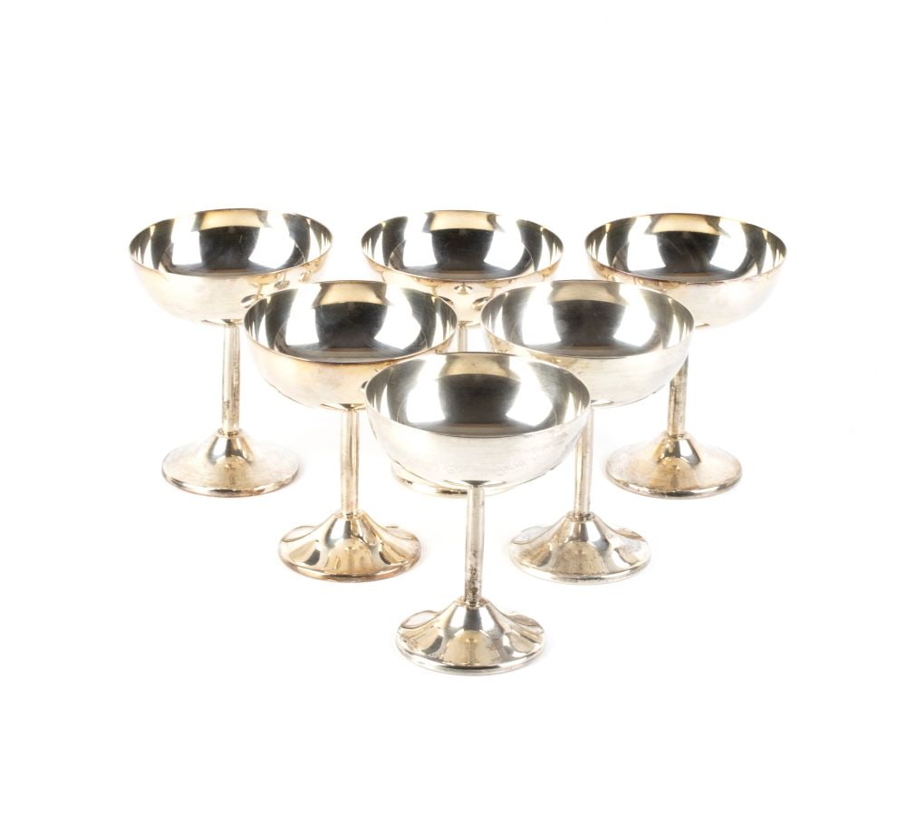 Set of six Italian solid silver bowls: characterised by a hemispherical bowl with a polished interior and exterior, supported by a slender stem resting on a circular, conical-shaped base.800/1000 silver, hallmarked “800 - 81 PA".