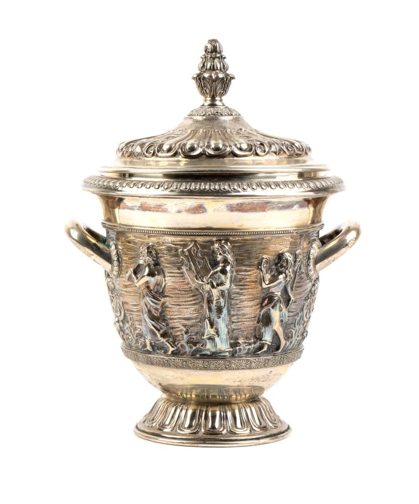 italian solid silver lidded cup: classically shaped and richly decorated with lid, featuring an ovoid body supported by a circular foot. The body is in relief, decorated with a classically inspired scene featuring figures in the
