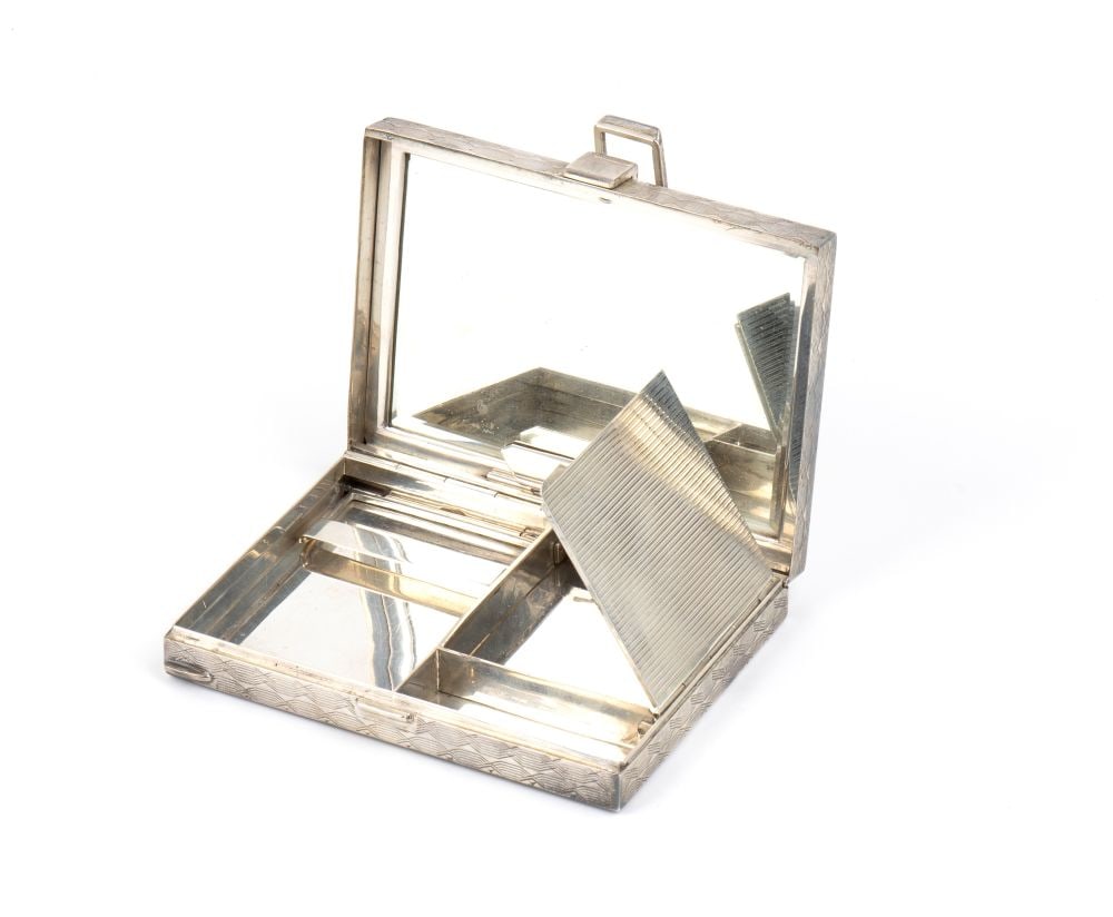 italian sterling silver make-up bag: rectangular in shape, engraved with geometric motifs and hinged lid.Sterling silver, hallmarkedn "925".