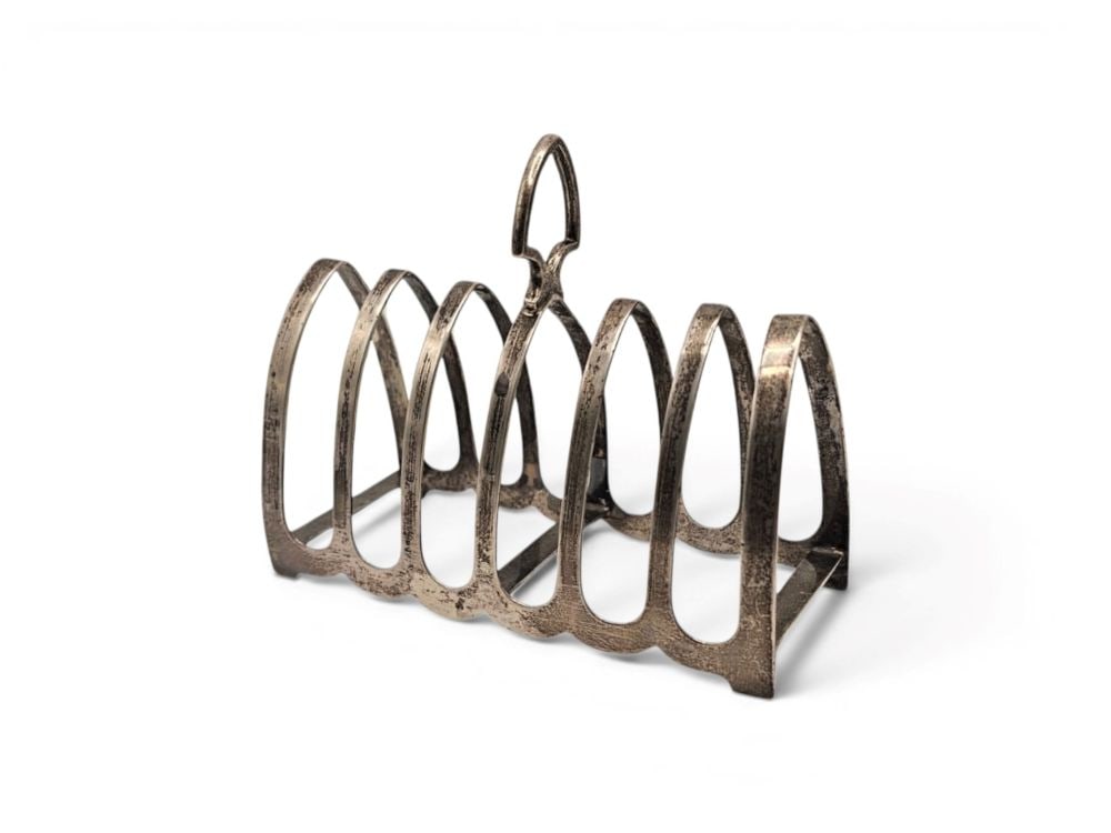 WILLIAM BRUFORD & SON Ltd. English Sterling silver toast rack: rectangular shaped with a geometric handle.Sterling silver, Fully hallmarked London, 1936-1937, silversmiths William Bruford & Son Ltd