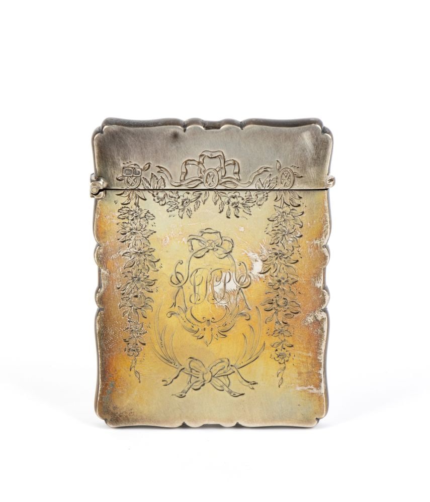 CORNELIUS DESORMEAUX SAUNDERS & JAMES FRANCIS HOLLINGS (FRANK) SHEPHERD English Edwardian sterling: rectangular in shape with moulded edges all round. It has a waxed lid with a side fastening. The central body is richly decorated with floral festoons and garlands. In the centre is a monogram framed