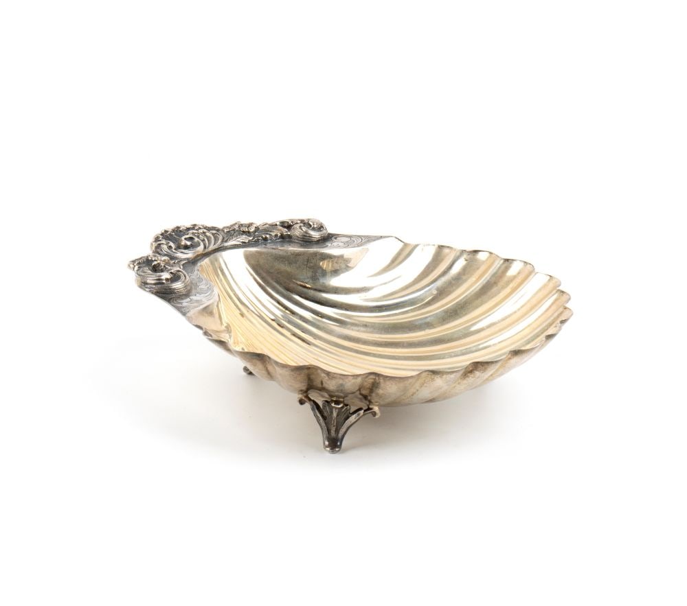 italian solid silver shell basket: shell-shaped, resting on three leaf-shaped feet.800/1000 silver, hallmarked "800".