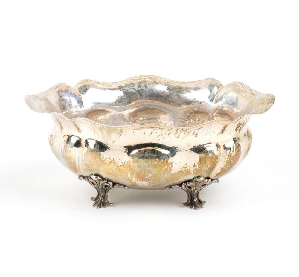 italian solid silver bowl: with a contoured body resting on four feet shaped like stylised leaves.800/1000 silver, hallmarked "800".