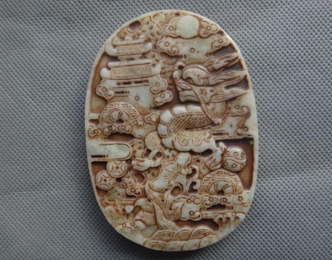 Chinese white jade hand-carved dragon statue (1 of 2)