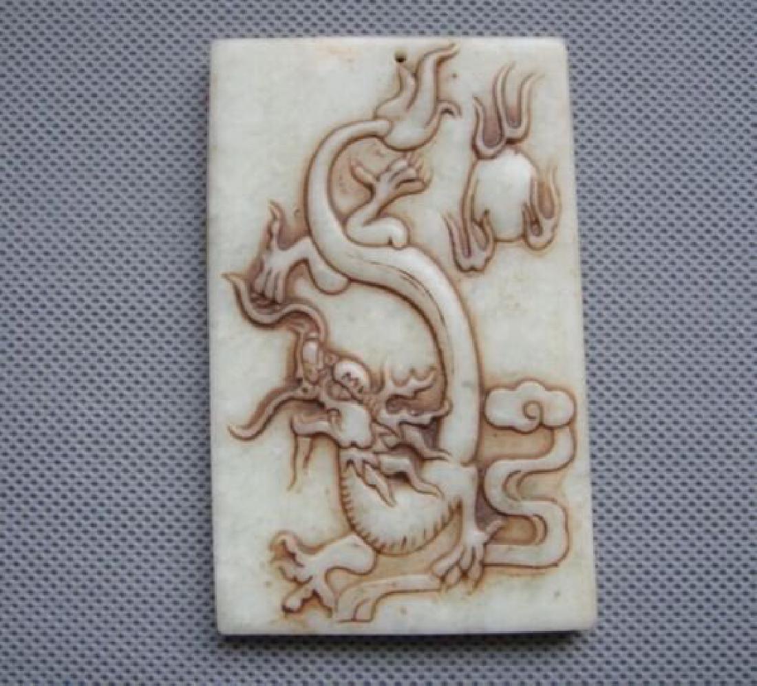 Old China White Jade hand-carved dragon Pendants. (1 of 2)